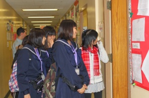 Quilin Li leads a tour of our school